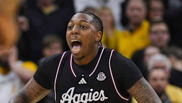 Feb 8, 2025; Columbia, Missouri, USA; Texas A&M Aggies guard Wade Taylor IV (4) celebrates after defeating the Missouri Tigers at Mizzou Arena. Mandatory Credit: Jay Biggerstaff-Imagn Images
