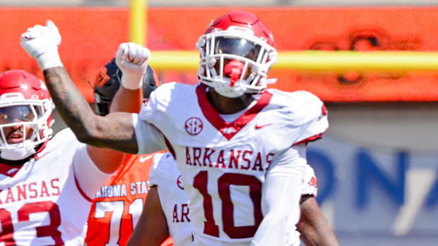 Razorbacks linebacker Xavian Sorey celebrates a play against Oklahoma State.