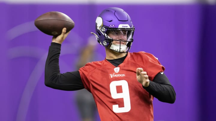 Vikings quarterback J.J. McCarthy works during Minnesota's offseason OTAs on June 12, 2024.