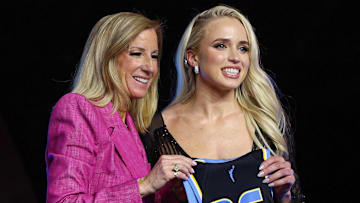 Hailey Van Lith poses with WNBA commissioner Cathy Engelbert after being selected by the Chicago Sky in the 2025 WNBA Draft.