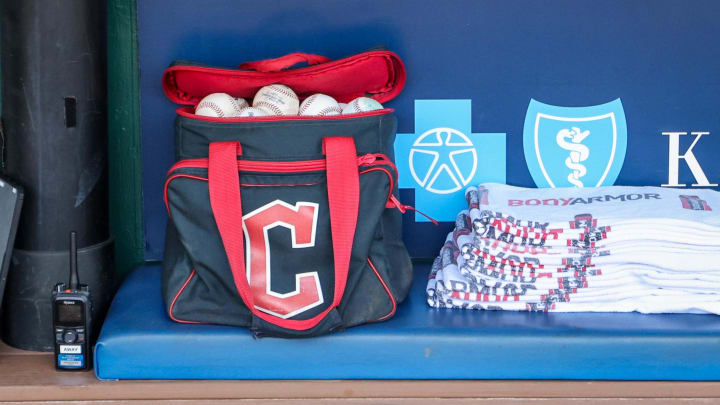 Jun 30, 2024; Kansas City, Missouri, USA; Cleveland Guardians ball bag sits in the dugout prior to the game against the Kansas City Royals at Kauffman Stadium. Mandatory Credit: William Purnell-USA TODAY Sports