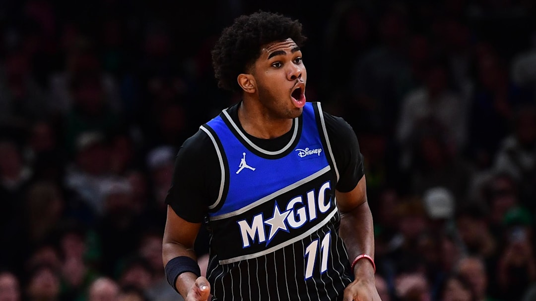 Nov 23, 2025; Boston, Massachusetts, USA; Orlando Magic guard Jase Richardson (11) reacts after making a three point basket during the second half against the Boston Celtics at TD Garden. Mandatory Credit: Bob DeChiara-Imagn Images