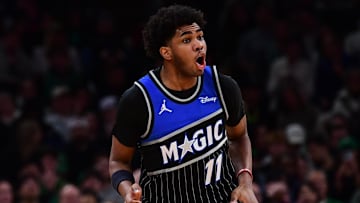 Nov 23, 2025; Boston, Massachusetts, USA; Orlando Magic guard Jase Richardson (11) reacts after making a three point basket during the second half against the Boston Celtics at TD Garden. Mandatory Credit: Bob DeChiara-Imagn Images