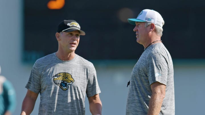 Jaguars general manager Trent Baalke talks with Jacksonville Jaguars head coach Doug Pederson on the field during the fourth day of the NFL football training camp practice session Saturday, July 27, 2024 at EverBank Stadium's Miller Electric Center in Jacksonville, Fla.