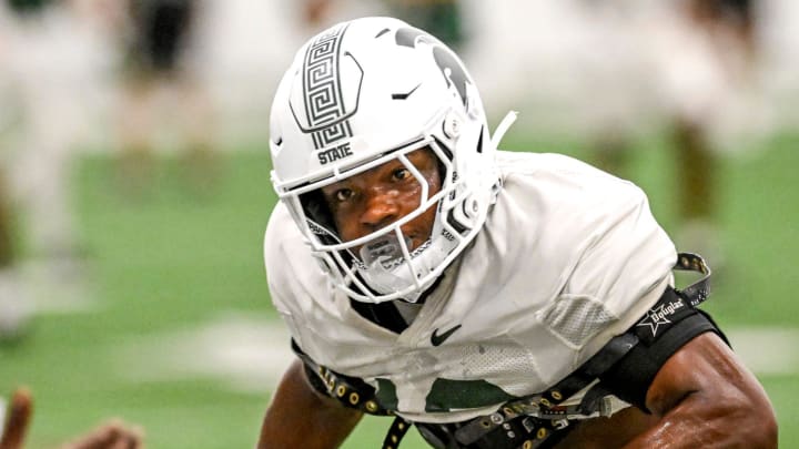 Michigan State's Armorion Smith runs a drill during camp on Monday, Aug. 5, 2024, at the indoor practice facility in East Lansing.