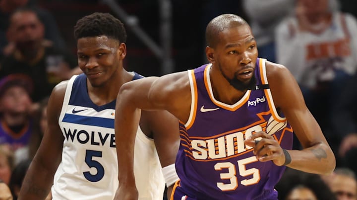 Phoenix Suns forward Durant against Minnesota Timberwolves guard Edwards at Footprint Center.