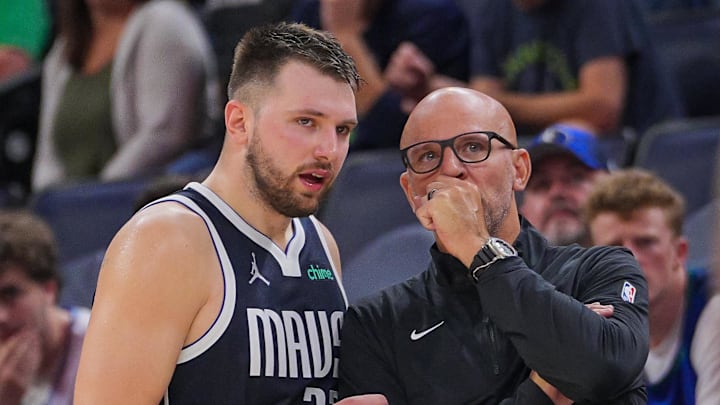 Dallas Mavericks guard Luka Doncic and head coach Jason Kidd talk during a game. Dallas Mavericks guard Luka Doncic and head coach Jason Kidd talk during a game.
