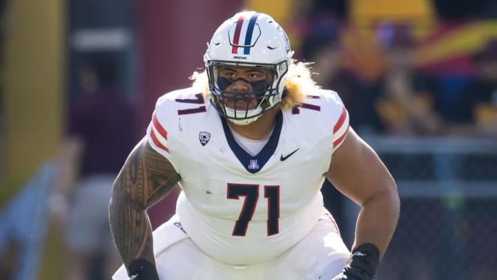 Nov 25, 2023; Tempe, Arizona, USA; Arizona Wildcats offensive lineman Jonah Savaiinaea (71) against the Arizona State Sun Devils during the Territorial Cup at Mountain America Stadium