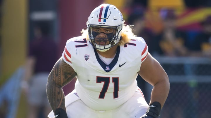 Nov 25, 2023; Tempe, Arizona, USA; Arizona Wildcats offensive lineman Jonah Savaiinaea (71) against the Arizona State Sun Devils during the Territorial Cup at Mountain America Stadium. Mandatory Credit: Mark J. Rebilas-USA TODAY Sports