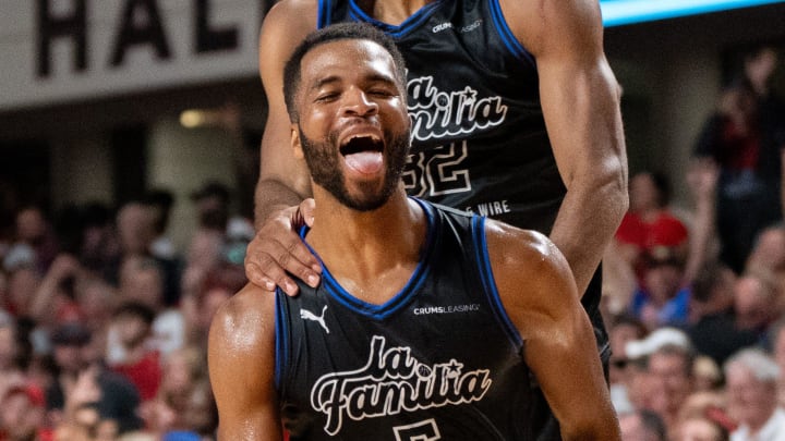 La Familia's Andrew Harrison (5) celebrates shooting the game winning point ending the game 70-61 against The Ville on Monday, July 29, 2024 at Freedom Hall in Louisville, Ky.