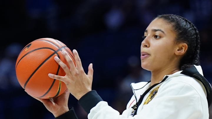 UConn Huskies guard Azzi Fudd warms up before the start of the game against the Florida State Seminoles. UConn Huskies guard Azzi Fudd warms up before the start of the game against the Florida State Seminoles.