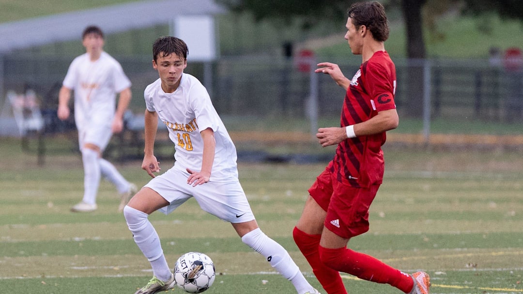Louisville Collegiate's Andrew Caborn (right) fights for the ball against Daviess' Carter Payne (11) during a game on Thursday, Oct. 31, 2024 at Paul Dunbar High School for the KHSAA state tournament semifinals.. Louisville Collegiate's Andrew Caborn (right) fights for the ball against Daviess' Carter Payne (11) during a game on Thursday, Oct. 31, 2024 at Paul Dunbar High School for the KHSAA state tournament semifinals..