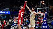 Nebraska forward Berke Büyüktuncel shoots a 3 against the Huskies.