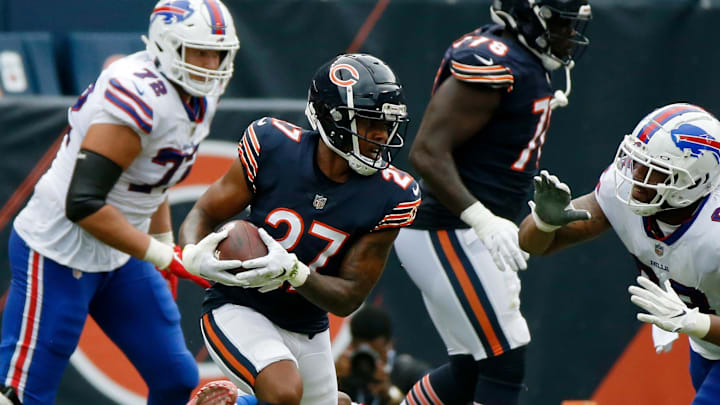 Aug 21, 2021; Chicago, Illinois, USA; Chicago Bears cornerback Thomas Graham Jr. (27) runs with the ball as Buffalo Bills offensive tackle Bobby Hart (68) closes in during the second half at Soldier Field. The Buffalo Bills won 41-15. Mandatory Credit: Jon Durr-Imagn Images