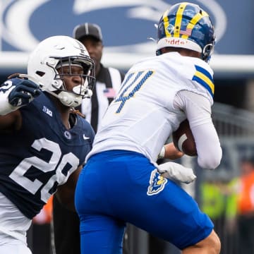 Penn State defensive tackle Zane Durant sacks Delaware quarterback Ryan O'Connor at Beaver Stadium. 