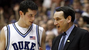 Duke basketball guard JJ Redick and head coach Mike Krzyzewski