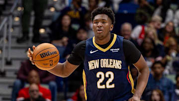 Nov 12, 2025; New Orleans, Louisiana, USA;  New Orleans Pelicans center Derik Queen (22) brings the ball up court against the Portland Trail Blazers during the second half at Smoothie King Center. Mandatory Credit: Stephen Lew-Imagn Images