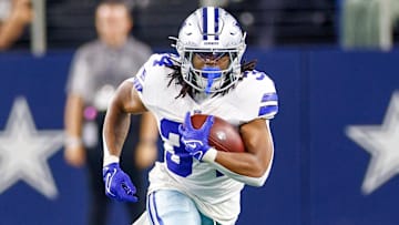 Aug 22, 2025; Arlington, Texas, USA; Dallas Cowboys running back Jaydon Blue (34) carries the ball during the fourth quarter against the Atlanta Falcons at AT&T Stadium. Mandatory Credit: Andrew Dieb-Imagn Images
