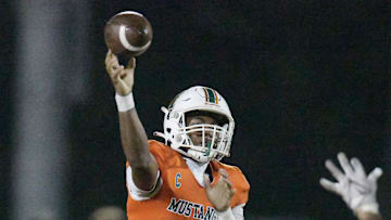 Mandarin's quarterback Tramell Jones (1) throws a pass during third quarter action. The Atlantic Coast Stingrays traveled to Mandarin to play the Mustangs in High School football Friday, September 15, 2023.