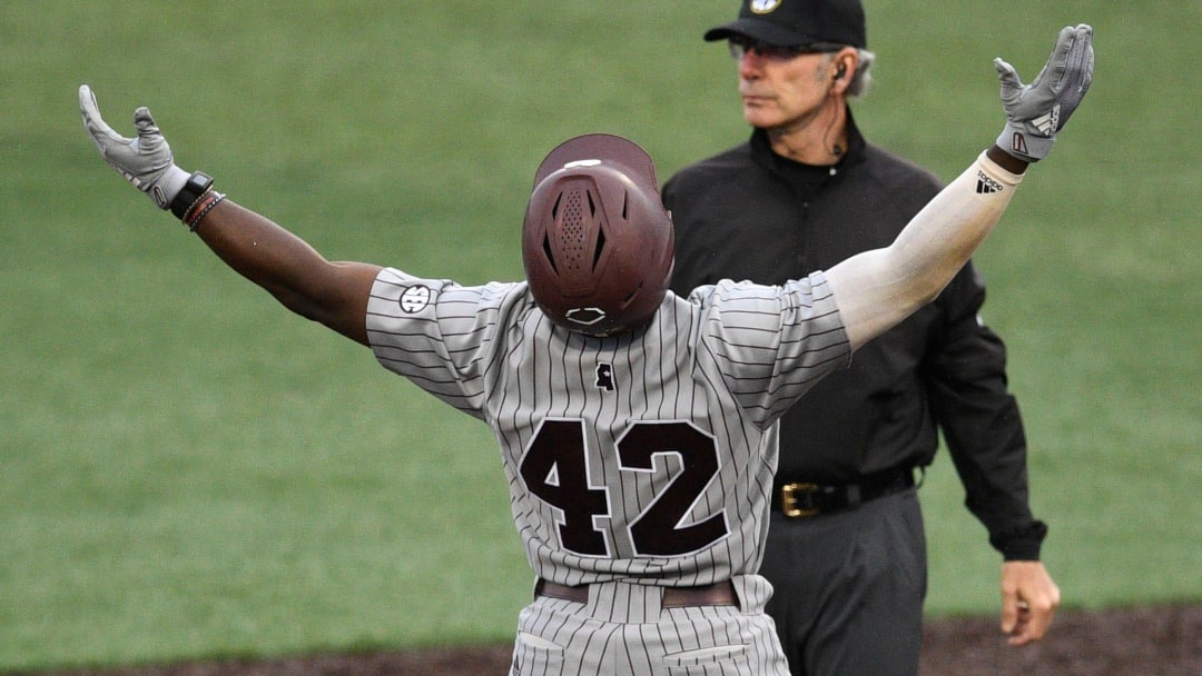 Mississippi State's Dakota Jordan (42) celebrates after hitting a double during the NCAA baseball game against Tennessee in Knoxville, Tenn. on Thursday, April 27, 2023.

Ut Baseball Miss St