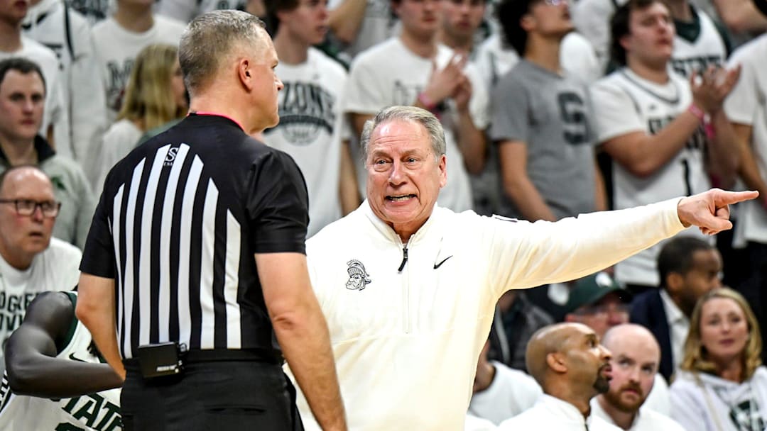 Michigan State's head coach Tom Izzo argues a call with a referee