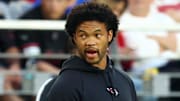 Dec 7, 2025; Glendale, Arizona, USA; Arizona Cardinals quarterback Kyler Murray (1) on the side line against the Los Angeles Rams during the second half at State Farm Stadium. Mandatory Credit: Mark J. Rebilas-Imagn Images