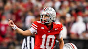Ohio State Buckeyes quarterback Julian Sayin (10) speaks to his teammates in the second half of the NCAA college football game at Ohio Stadium on Saturday, Nov. 15, 2025 in Columbus, Ohio.