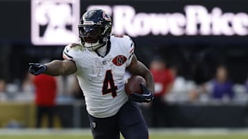Oct 26, 2025; Baltimore, Maryland, USA; Chicago Bears running back D'Andre Swift (4) carries the ball against the Baltimore Ravens at M&T Bank Stadium. Mandatory Credit: Geoff Burke-Imagn Images