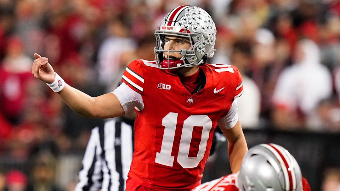 Ohio State Buckeyes quarterback Julian Sayin (10) speaks to his teammates in the second half of the NCAA college football game at Ohio Stadium on Saturday, Nov. 15, 2025 in Columbus, Ohio.