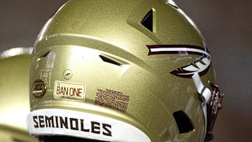 Sep 8, 2018; Tallahassee, FL, USA; Florida State Seminoles had a special sticker on their helmets to honor former FSU player Burt Reynolds who died this past week.  The Florida State Seminoles host the Samford Bulldogs at Doak Campbell Stadium. Florida State won 36-26. Mandatory Credit: Glenn Beil-Imagn Images