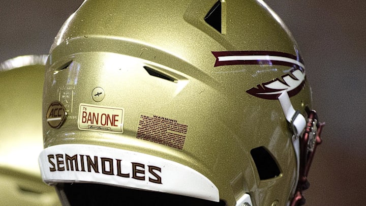 Sep 8, 2018; Tallahassee, FL, USA; Florida State Seminoles had a special sticker on their helmets to honor former FSU player Burt Reynolds who died this past week.  The Florida State Seminoles host the Samford Bulldogs at Doak Campbell Stadium. Florida State won 36-26. Mandatory Credit: Glenn Beil-Imagn Images