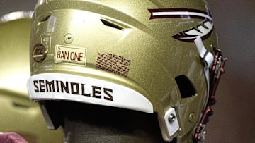 Sep 8, 2018; Tallahassee, FL, USA; Florida State Seminoles had a special sticker on their helmets to honor former FSU player Burt Reynolds who died this past week.  The Florida State Seminoles host the Samford Bulldogs at Doak Campbell Stadium. Florida State won 36-26. Mandatory Credit: Glenn Beil-Imagn Images