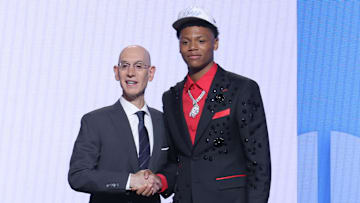Ace Bailey stands with NBA commissioner Adam Silver