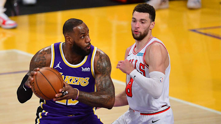 Los Angeles Lakers forward LeBron James (23) moves to the basket against Chicago Bulls guard Zach LaVine (8) during the first half at Staples Center. Mandatory Credit: Gary A. Vasquez-Imagn Images