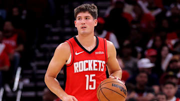 Oct 27, 2025; Houston, Texas, USA; Houston Rockets guard Reed Sheppard (15) handles the ball against the Brooklyn Nets during the second quarter at Toyota Center. Mandatory Credit: Erik Williams-Imagn Images