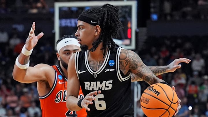 Mar 21, 2026; Greenville, SC, USA; VCU Rams guard Terrence Hill Jr. (6) drives to the basket against Illinois Fighting Illini guard Kylan Boswell (4) during the second half during a second round game of the men's 2026 NCAA Tournament at Bon Secours Wellness Arena. Mandatory Credit: Jim Dedmon-Imagn Images