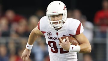 Sep 27, 2014; Arlington, TX, USA; Arkansas Razorbacks punter Sam Irwin-Hill (92) runs with the ball against the Texas A&M Aggies at AT&T Stadium. Mandatory Credit: Matthew Emmons-Imagn Images