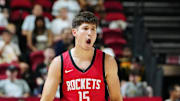 Jul 14, 2024; Las Vegas, NV, USA; Houston Rockets guard Reed Sheppard (15) reacts after scoring against the Washington Wizards during the third quarter at Thomas & Mack Center. Mandatory Credit: Stephen R. Sylvanie-Imagn Images