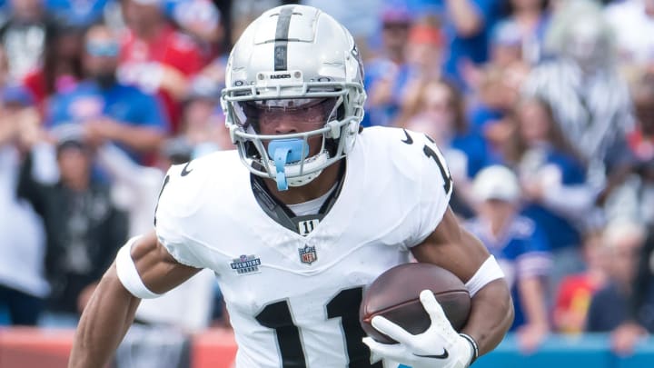 Sep 17, 2023; Orchard Park, New York, USA; Las Vegas Raiders wide receiver Tre Tucker (11) runs after making a catch against the Buffalo Bills in the first quarter at Highmark Stadium. Mandatory Credit: Mark Konezny-USA TODAY Sports
