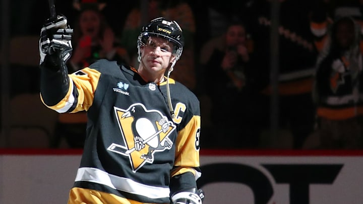 Pittsburgh Penguins center Sidney Crosby reacts to being named first star of the game.