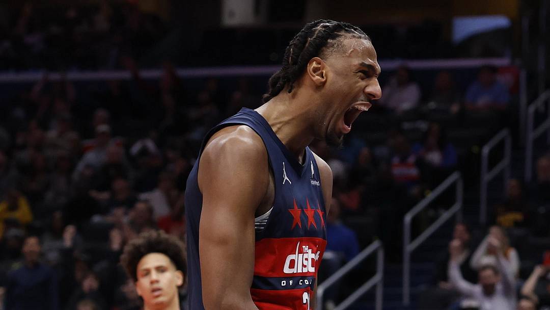 Nov 25, 2025; Washington, District of Columbia, USA; Washington Wizards center Alex Sarr (20) reacts after a dunk alongside Wizards forward Justin Champagnie (9) against the Atlanta Hawks in the second half at Capital One Arena. Mandatory Credit: Geoff Burke-Imagn Images
