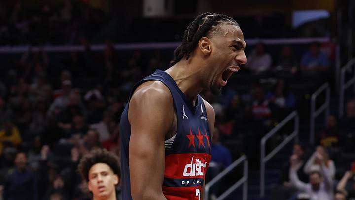 Nov 25, 2025; Washington, District of Columbia, USA; Washington Wizards center Alex Sarr (20) reacts after a dunk alongside Wizards forward Justin Champagnie (9) against the Atlanta Hawks in the second half at Capital One Arena. Mandatory Credit: Geoff Burke-Imagn Images