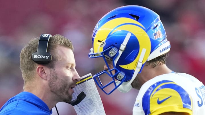 Los Angeles Rams head coach Sean McVay talks with Los Angeles Rams quarterback Matthew Stafford (9). Mandatory Credit: Kyle Terada-Imagn Images