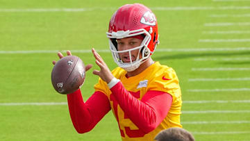 Jul 22, 2025; St. Joseph, MO, USA; Kansas City Chiefs quarterback Patrick Mahomes (15) receives a snap during training camp at Missouri Western State University. Mandatory Credit: Denny Medley-Imagn Images