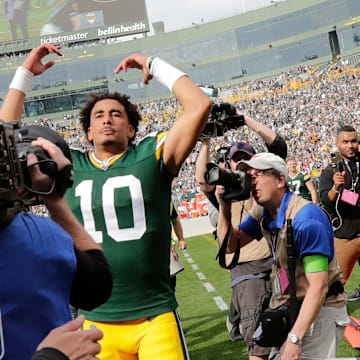 Green Bay Packers quarterback Jordan Love (10) celebrates his victory over the Saints in his first home start.