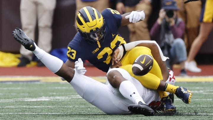 Sep 24, 2022; Ann Arbor, Michigan, USA; Michigan Wolverines running back C.J. Stokes (23) fumbles in the first half against the Maryland Terrapins at Michigan Stadium. Mandatory Credit: Rick Osentoski-USA TODAY Sports