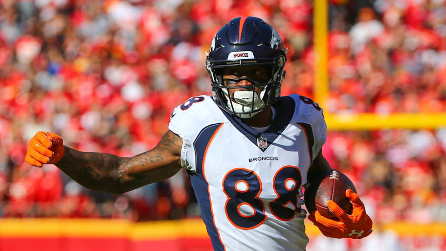 Former Denver Broncos wide receiver Demaryius Thomas runs with the ball. | Jay Biggerstaff-Imagn Images
