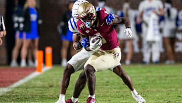 Florida State Seminoles wide receiver Hykeem Williams (8) tries to fight off a tackle. The Florida State Seminoles defeated the Duke Blue Devils 38-20 on Saturday, Oct. 21, 2023.