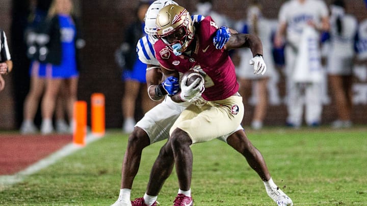 Florida State Seminoles wide receiver Hykeem Williams (8) tries to fight off a tackle. The Florida State Seminoles defeated the Duke Blue Devils 38-20 on Saturday, Oct. 21, 2023.