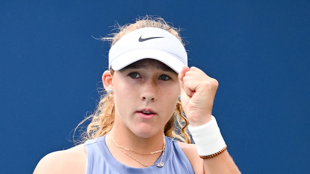 Mirra Andreeva reacts after scoring a point against McCartney Kessler 